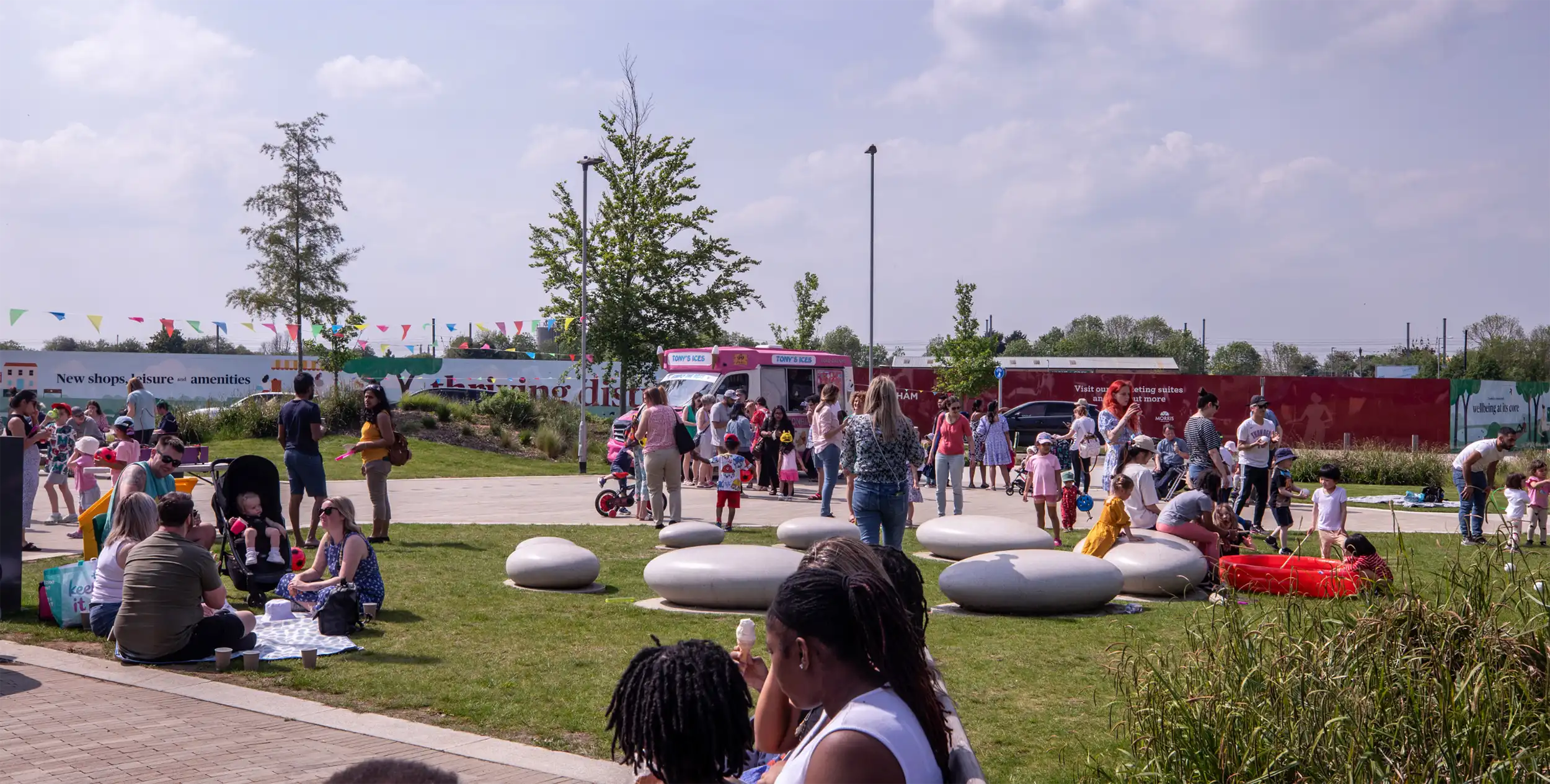 People socialising outside with at the Family Fun Day